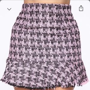 Pink and black mini skirt